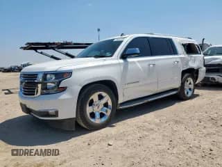 2015 Chevrolet Suburban LTZ с VIN 1GNSCKKC0FR258159, выставлен на аукционе Copart как лот 70594305 с пробегом 101 379 миль миль и Списание • Salvage title. История ставок и продаж доступна на DreamBid. Изображение 1.