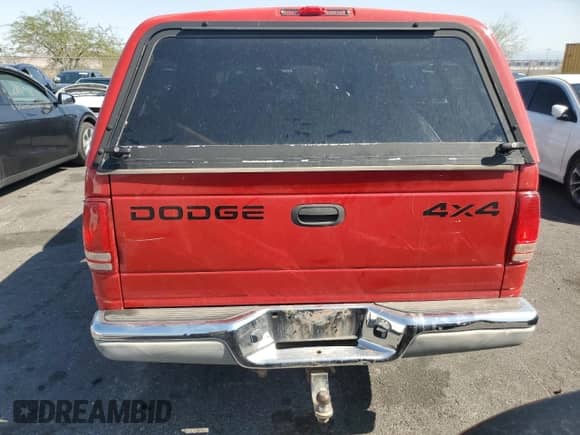 2000 Dodge Dakota Sport with VIN 1B7GG2AN3YS704614, listed as a Copart auction lot 62407275 with 208,111 mi miles and Salvage title. Bid and sale history available at DreamBid. Image 6.