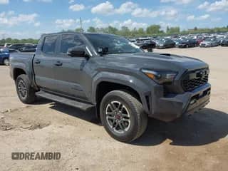 2024 Toyota Tacoma SR5 with VIN 3TMLB5JN2RM054571, listed as a IAAI auction lot 42572496 with 7,157 mi miles and . Bid and sale history available at DreamBid. Image 1.
