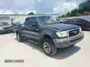 1998 Toyota Tacoma z VIN 4TASM92N7WZ121828, wystawiony jako Copart lot #64122235 z przebiegiem 200 637 mil mil oraz Szkoda całkowita • Salvage title. Historia ofert i sprzedaży dostępna na DreamBid. Obrazek 13.