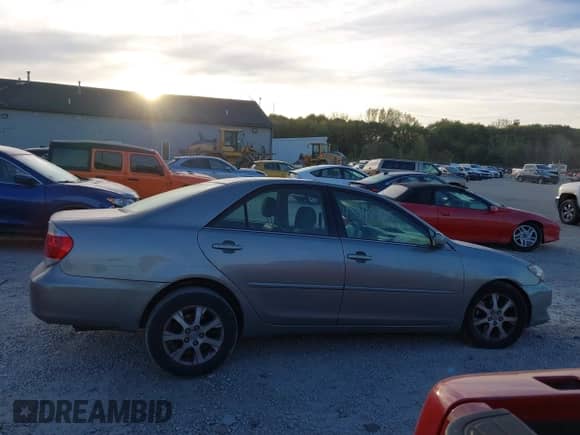 2005 Toyota Camry XLE with VIN 4T1BF30K95U613997, listed as a IAAI auction lot 43348925 with 122,617 mi miles and . Bid and sale history available at DreamBid. Image 12.