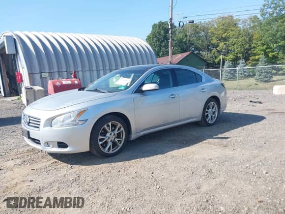 2014 Nissan Maxima SV z VIN 1N4AA5APXEC487987, wystawiony jako IAAI lot #42965512 z przebiegiem 224 110 mil mil oraz . Historia ofert i sprzedaży dostępna na DreamBid. Obrazek 17.