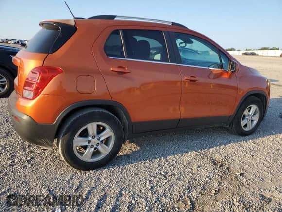 2015 Chevrolet Trax LT with VIN KL7CJLSBXFB056614, listed as a Copart auction lot 68942815 with 122,118 mi miles and Salvage title. Bid and sale history available at DreamBid. Image 3.