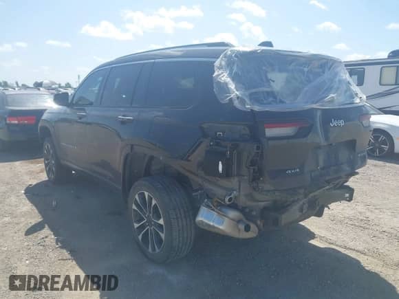 2023 Jeep Grand Cherokee Overland z VIN 1C4RJKDG5P8771928, wystawiony jako IAAI lot #42602996 z przebiegiem 32 691 mil mil oraz . Historia ofert i sprzedaży dostępna na DreamBid. Obrazek 3.