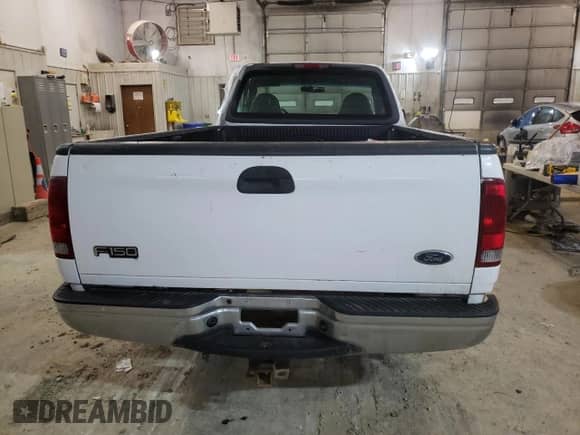 2002 Ford F-150 XL z VIN 1FTRF18W72KB04366, wystawiony jako Copart lot #54933503 z przebiegiem 182 593 mil mil oraz Nie do naprawy • Non repairable. Historia ofert i sprzedaży dostępna na DreamBid. Obrazek 6.
