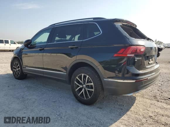 2021 Volkswagen Tiguan SE с VIN 3VV3B7AX6MM058484, выставлен на аукционе Copart как лот 80495865 с пробегом 87 694 миль миль и Списание • Salvage title. История ставок и продаж доступна на DreamBid. Изображение 2.