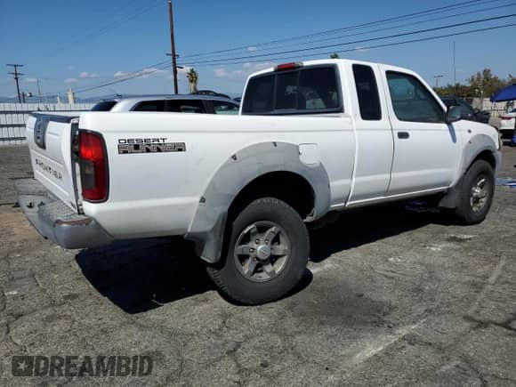 2002 Nissan Frontier XE with VIN 1N6ED26T52C304849, listed as a Copart auction lot 81852985 with 184,485 mi miles and Salvage title. Bid and sale history available at DreamBid. Image 3.