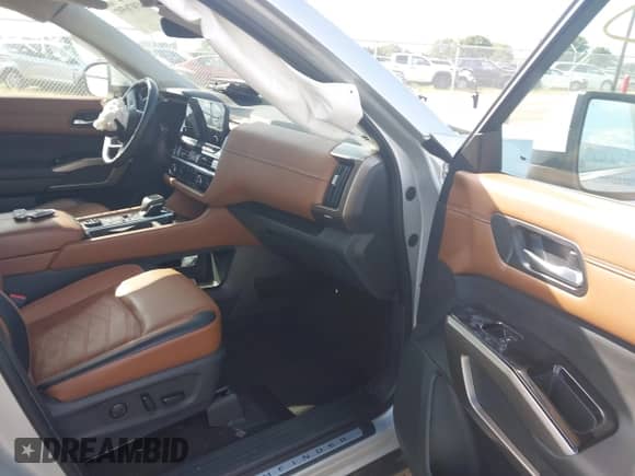 2023 Nissan Pathfinder Platinum with VIN 5N1DR3DJ1PC211949, listed as a IAAI auction lot 43076597 with 50,909 mi miles and . Bid and sale history available at DreamBid. Image 5.