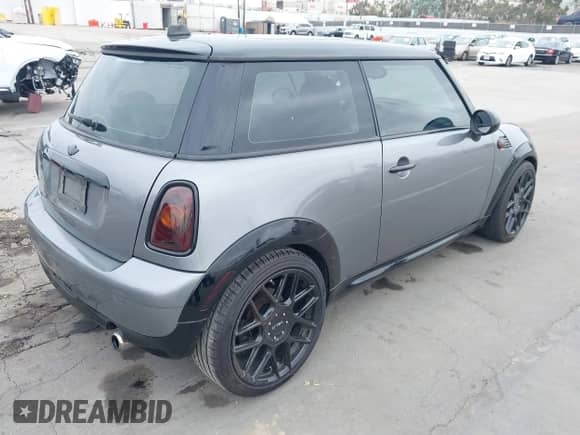 2010 MINI Hardtop with VIN WMWMF3C58ATZ60995, listed as a IAAI auction lot 42454882 with 147,607 mi miles and . Bid and sale history available at DreamBid. Image 4.