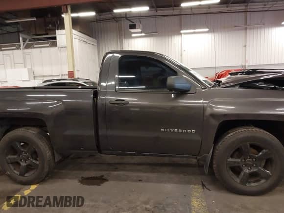 2014 Chevrolet Silverado 1500 Work Truck with VIN 1GCNCPEC7EZ269186, listed as a IAAI auction lot 40896337 with 127,410 mi miles and . Bid and sale history available at DreamBid. Image 14.