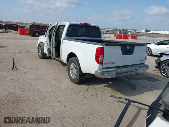 2015 Nissan Frontier SL with VIN 1N6AD0FV0FN753922, listed as a IAAI auction lot 42064732 with 184,951 mi miles and . Bid and sale history available at DreamBid. Image 3.