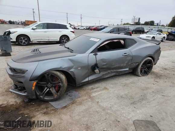 2021 Chevrolet Camaro 2SS с VIN 1G1FH1R75M0120383, выставлен на аукционе Copart как лот 85164105 с пробегом 54 920 миль миль и Списание • Salvage title. История ставок и продаж доступна на DreamBid. Изображение 1.