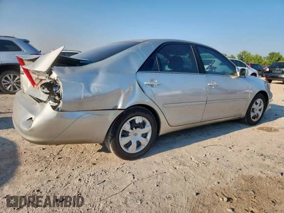 2005 Toyota Camry STD with VIN 4T1BE32K75U526986, listed as a Copart auction lot 69859045 with 304,006 mi miles and Salvage title. Bid and sale history available at DreamBid. Image 3.