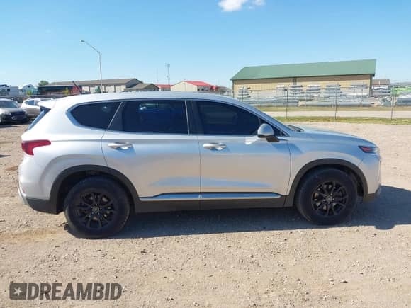 2019 Hyundai Santa Fe SE z VIN 5NMS2CAD0KH001481, wystawiony jako IAAI lot #43080403 z przebiegiem 82 196 mil mil oraz . Historia ofert i sprzedaży dostępna na DreamBid. Obrazek 13.