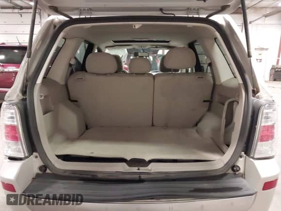 2008 Mercury Mariner with VIN 4M2CU91148KJ42603, listed as a IAAI auction lot 42311239 with 173,554 mi miles and . Bid and sale history available at DreamBid. Image 19.