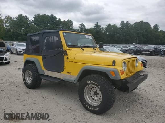 2000 Jeep Wrangler SE with VIN 1J4FA29P0YP775110, listed as a Copart auction lot 71498795 with 72,782 mi miles and Clean title. Bid and sale history available at DreamBid. Image 4.