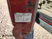 2002 Chevrolet Suburban LT z VIN 1GNEC16ZX2J231601, wystawiony jako Copart lot #75348404 z przebiegiem Nie podano mil oraz Szkoda całkowita • Salvage title. Historia ofert i sprzedaży dostępna na DreamBid. Obrazek 15.