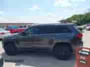 2018 Jeep Grand Cherokee Laredo E with VIN 1C4RJEAG6JC304365, listed as a IAAI auction lot 43023758 with 140,626 mi miles and . Bid and sale history available at DreamBid. Image 14.