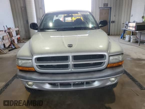 2003 Dodge Dakota Sport с VIN 1D7HG38N03S170907, выставлен на аукционе Copart как лот 46998985 с пробегом 97 805 миль миль и Списание • Salvage title. История ставок и продаж доступна на DreamBid. Изображение 5.