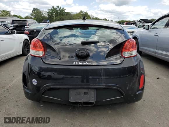 2012 Hyundai Veloster w/Gray Int z VIN KMHTC6AD8CU046631, wystawiony jako Copart lot #68106965 z przebiegiem 120 090 mil mil oraz Szkoda całkowita • Salvage title. Historia ofert i sprzedaży dostępna na DreamBid. Obrazek 6.
