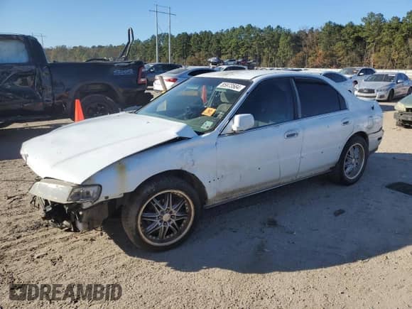 1994 Honda Accord LX z VIN 1HGCD5639RA156529, wystawiony jako Copart lot #85973584 z przebiegiem 144 699 mil mil oraz Szkoda całkowita • Salvage title. Historia ofert i sprzedaży dostępna na DreamBid. Obrazek 1.