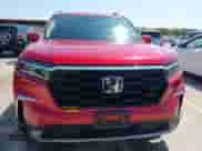 2023 Honda Pilot Touring z VIN 5FNYG2H72PB000671, wystawiony jako IAAI lot #43018124 z przebiegiem 55 569 mil mil oraz . Historia ofert i sprzedaży dostępna na DreamBid. Obrazek 12.