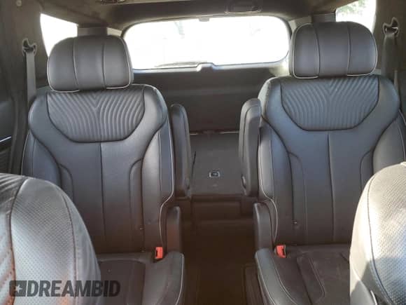 2023 Hyundai Palisade Calligraphy с VIN KM8R74GE5PU601026, выставлен на аукционе Copart как лот 51806555 с пробегом 11 622 миль миль и Списание • Salvage title. История ставок и продаж доступна на DreamBid. Изображение 10.