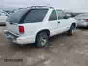 2002 Chevrolet Blazer LS с VIN 1GNCS18W42K105497, выставлен на аукционе IAAI как лот 41572072 с пробегом 142 486 миль миль и . История ставок и продаж доступна на DreamBid. Изображение 4.