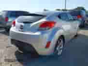 2012 Hyundai Veloster w/Black Int с VIN KMHTC6AD4CU021595, выставлен на аукционе IAAI как лот 42004371 с пробегом 149 637 миль миль и . История ставок и продаж доступна на DreamBid. Изображение 4.