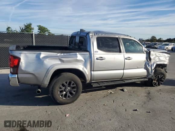 2020 Toyota Tacoma SR5 z VIN 5TFAZ5CN0LX092866, wystawiony jako Copart lot #89856555 z przebiegiem 49 224 mil mil oraz Czysty tytuł • Clean title. Historia ofert i sprzedaży dostępna na DreamBid. Obrazek 3.