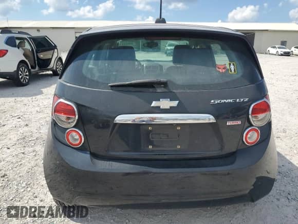 2015 Chevrolet Sonic LTZ with VIN 1G1JE6SB4F4203670, listed as a Copart auction lot 69920415 with 94,976 mi miles and Clean title. Bid and sale history available at DreamBid. Image 6.