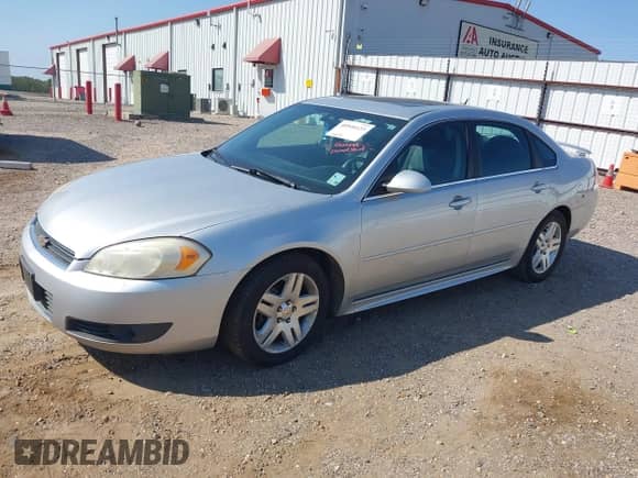 2011 Chevrolet Impala LT Fleet with VIN 2G1WG5EK0B1229369, listed as a IAAI auction lot 40546123 with 165,109 mi miles and . Bid and sale history available at DreamBid. Image 2.