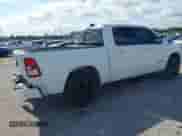 2021 Ram 1500 Lone Star z VIN 1C6RREFT1MN749997, wystawiony jako IAAI lot #41306635 z przebiegiem 59 451 mil mil oraz . Historia ofert i sprzedaży dostępna na DreamBid. Obrazek 4.