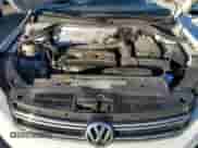 2014 Volkswagen Tiguan SEL z VIN WVGAV3AX4EW626475, wystawiony jako Copart lot #43540255 z przebiegiem 84 057 mil mil oraz Nie do naprawy • Non repairable. Historia ofert i sprzedaży dostępna na DreamBid. Obrazek 12.