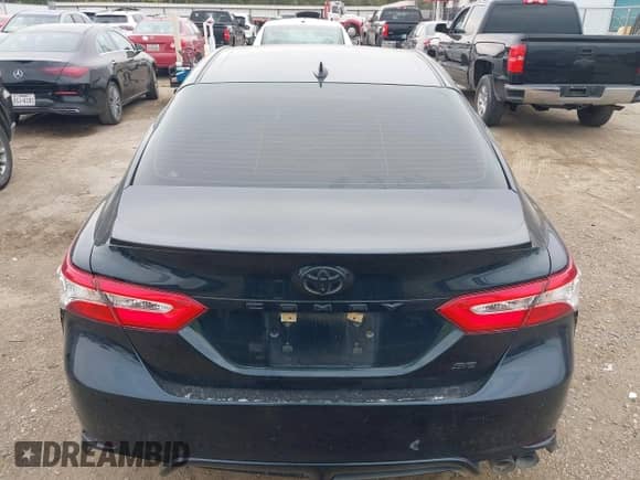 2020 Toyota Camry SE with VIN 4T1G11AK4LU955992, listed as a IAAI auction lot 43027088 with 77,002 mi miles and . Bid and sale history available at DreamBid. Image 16.