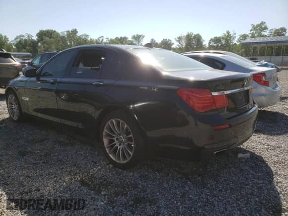 2012 BMW 7 Series 750i with VIN WBAKA8C59CDX01027, listed as a Copart auction lot 57881955 with 171,992 mi miles and Clean title. Bid and sale history available at DreamBid. Image 2.