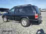 2004 Nissan Pathfinder SE with VIN JN8DR09Y64W903020, listed as a Copart auction lot 61984755 with 167,628 mi miles and Salvage title. Bid and sale history available at DreamBid. Image 2.