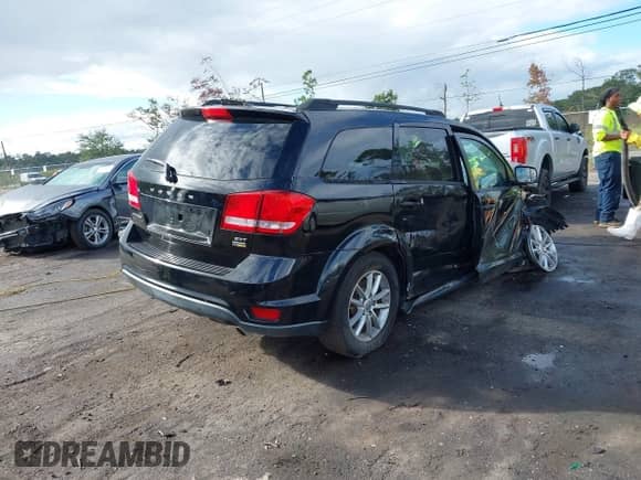 2015 Dodge Journey SXT with VIN 3C4PDCBGXFT649346, listed as a IAAI auction lot 43331826 with 103,169 mi miles and . Bid and sale history available at DreamBid. Image 4.