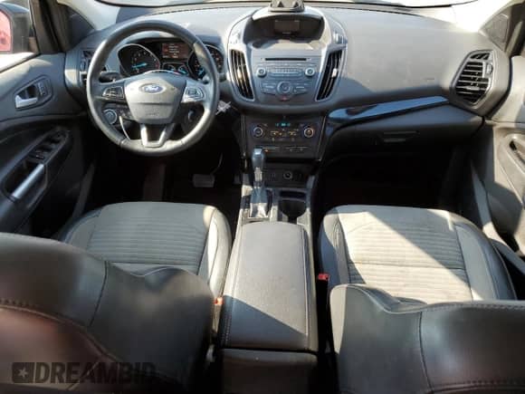 2018 Ford Escape SE z VIN 1FMCU9GD3JUC30233, wystawiony jako Copart lot #64203535 z przebiegiem 89 790 mil mil oraz Szkoda całkowita • Salvage title. Historia ofert i sprzedaży dostępna na DreamBid. Obrazek 8.