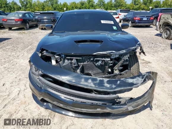 2022 Dodge Charger R/T с VIN 2C3CDXCT6NH235641, выставлен на аукционе Copart как лот 71658385 с пробегом 66 027 миль миль и Списание • Salvage title. История ставок и продаж доступна на DreamBid. Изображение 5.