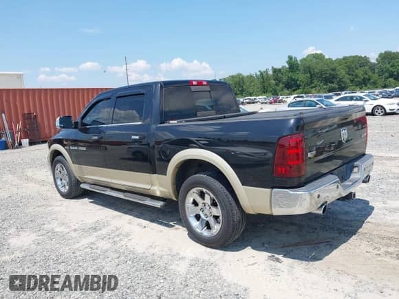 2011 Ram 1500 Outdoorsman with VIN 1D7RV1CT2BS531766, listed as a IAAI auction lot 42667044 with 220,722 mi miles and . Bid and sale history available at DreamBid. Image 3.