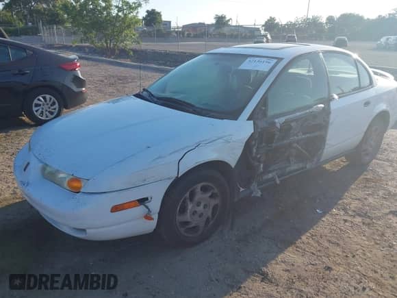 2002 Saturn SL with VIN 1G8ZF52872Z258630, listed as a IAAI auction lot 42136196 with 205,914 mi miles and . Bid and sale history available at DreamBid. Image 18.