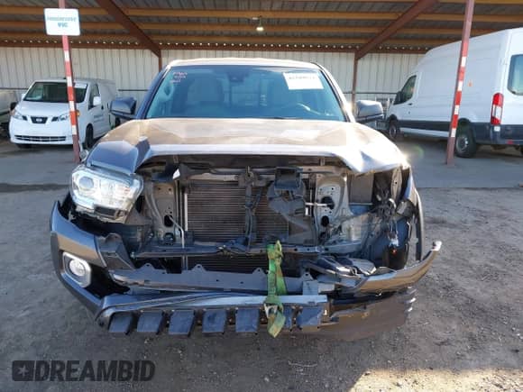 2021 Toyota Tacoma SR with VIN 3TYSZ5AN5MT036618, listed as a IAAI auction lot 41549574 with 52,177 mi miles and . Bid and sale history available at DreamBid. Image 13.