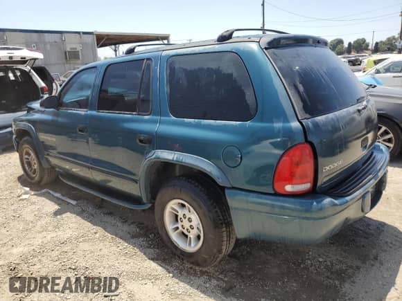 2000 Dodge Durango with VIN 1B4HR28Z5YF242716, listed as a Copart auction lot 65978215 with 184,802 mi miles and Salvage title. Bid and sale history available at DreamBid. Image 2.