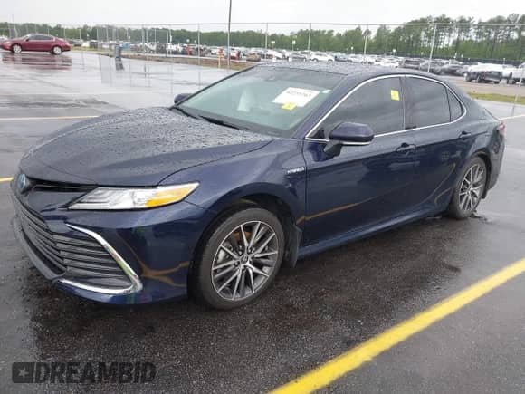 2021 Toyota Camry Hybrid XLE with VIN 4T1F31AK4MU546558, listed as a IAAI auction lot 42235763 with 62,299 mi miles and . Bid and sale history available at DreamBid. Image 19.