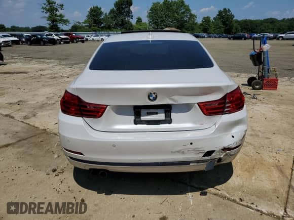 2016 BMW 4 Series 428i xDrive with VIN WBA3N9C56GK250493, listed as a Copart auction lot 63514855 with 166,061 mi miles and Salvage title. Bid and sale history available at DreamBid. Image 6.