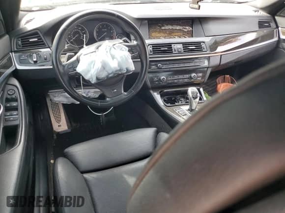 2013 BMW 5 Series 550i с VIN WBAFR9C50DDX79715, выставлен на аукционе Copart как лот 69807605 с пробегом Не указан миль и Списание • Salvage title. История ставок и продаж доступна на DreamBid. Изображение 8.