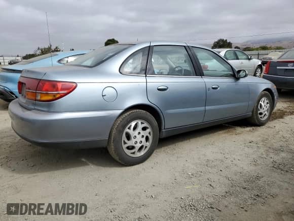 2002 Saturn LS with VIN 1G8JU54F32Y529705, listed as a Copart auction lot 71895554 with 60,088 mi miles and Salvage title. Bid and sale history available at DreamBid. Image 3.