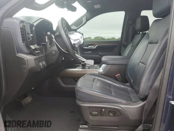 2023 Chevrolet Silverado 1500 High Country with VIN 1GCUDJE82PZ241915, listed as a Copart auction lot 65246765 with 61,743 mi miles and Salvage title. Bid and sale history available at DreamBid. Image 7.