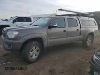 2014 Toyota Tacoma с VIN 3TMMU4FN1EM067694, выставлен на аукционе Copart как лот 48319775 с пробегом 112 407 миль миль и Чистый • Clean title. История ставок и продаж доступна на DreamBid. Изображение 1.